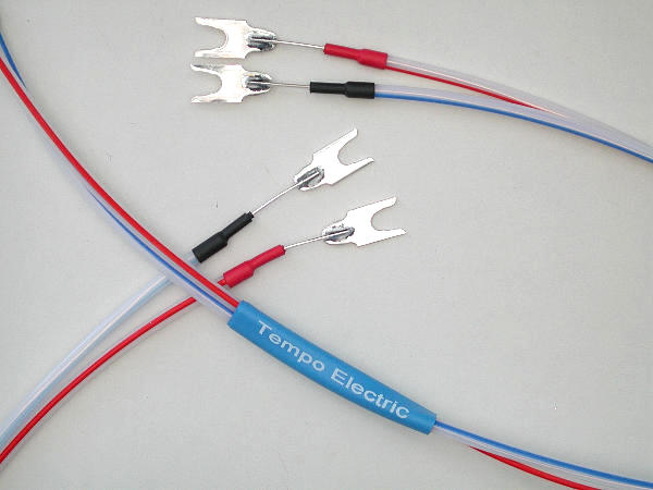 Pure Silver Speaker Cables in Semi-Clear striped Teflon jacket, terminated with Goertz Silver Spades